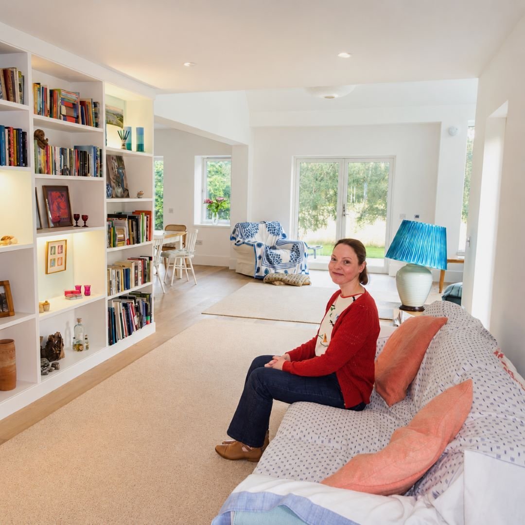 Photograph of a woman sitting in a rural cottage in Aberdeenshire